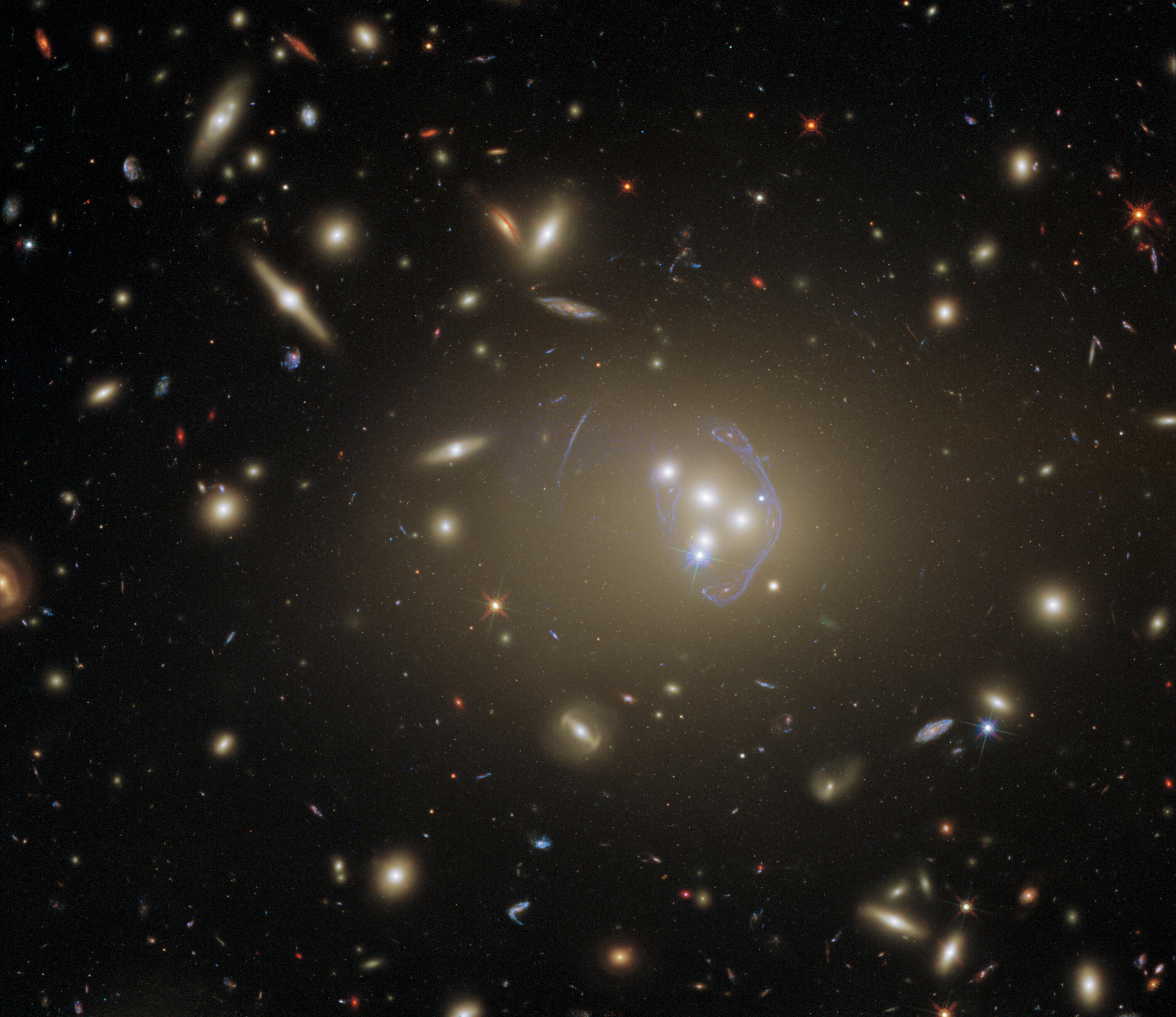 Hubble Gazes at a Cluster Full of Cosmic Clues Hubble Gazes at a Cluster Full of Cosmic Clues