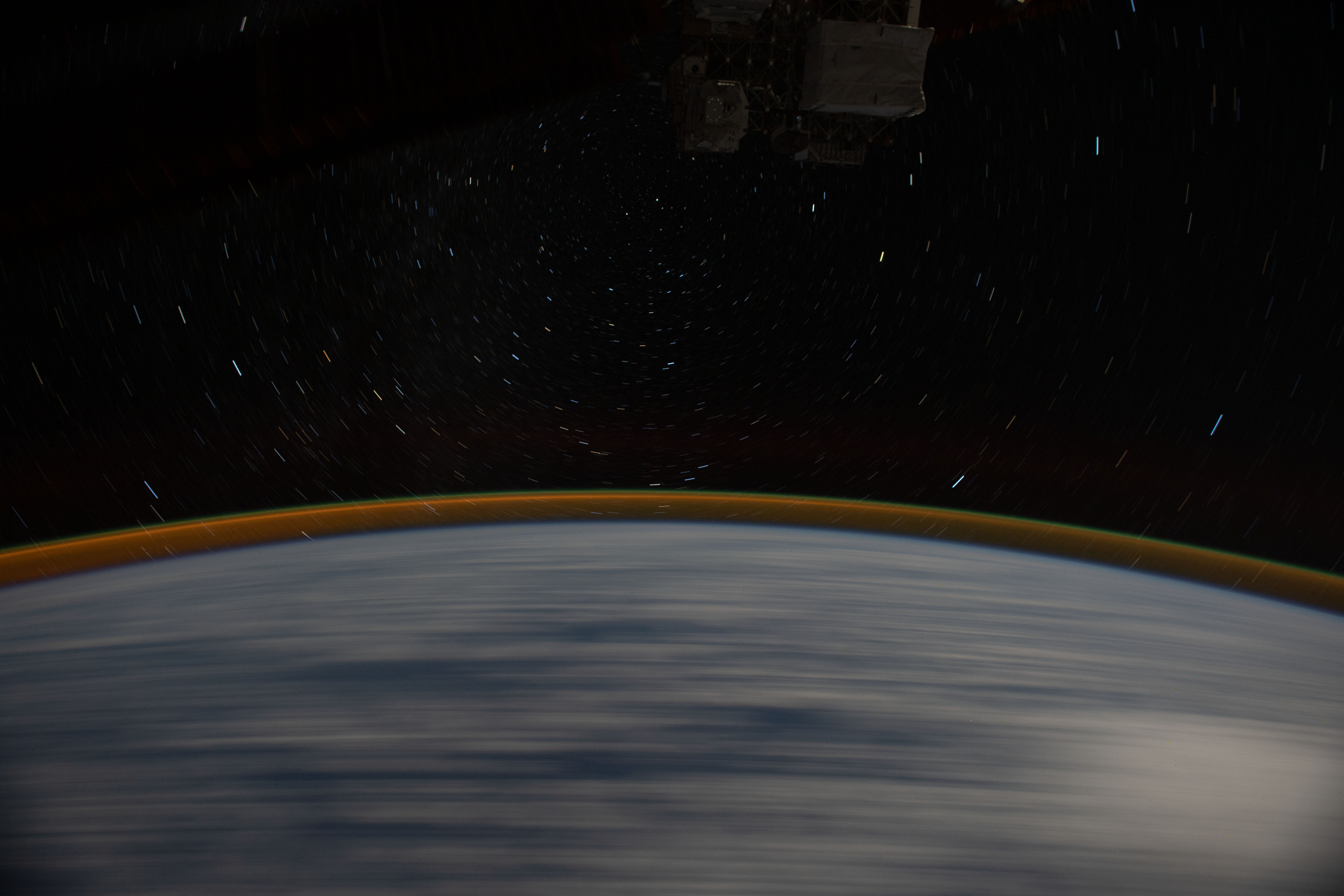 Earth’s Atmospheric Glow and Star Trails Earth’s Atmospheric Glow and Star Trails